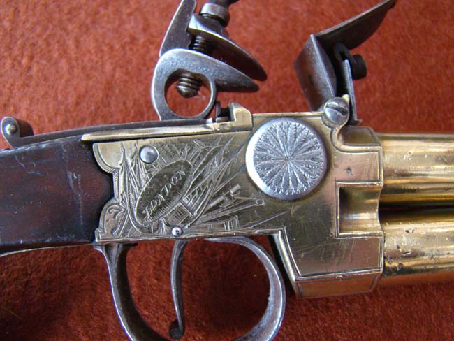 A fine British flintlock Naval Officer's over and under barreled flintlock pistol circa 1800-1810 — image 2